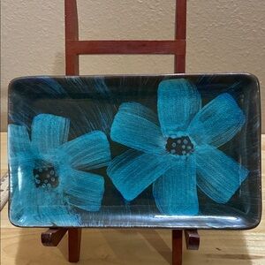Blue floral.  ceramic dish.  It’s about 5 inches. X 8 1/2 inch. .